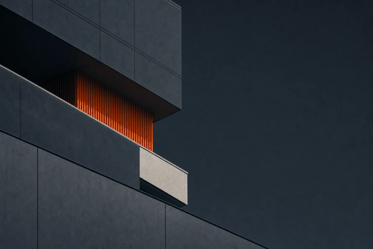 Dark architectural planes with one warm orange opening